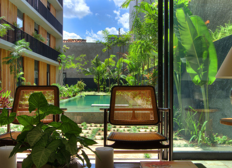 Brésil Voyage Manaus Villa Amazonia vue sur jardin intérieur avec piscine