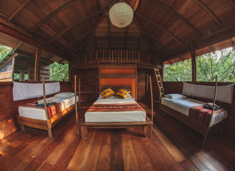 Colombie Voyage Cano Cristales Manigua Lodge bungalow intérieur quadruple